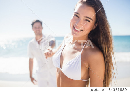 Close up of pretty woman holding the hand of her boyfriend Close up of pretty woman holding the hand of her boyfriend 24321880