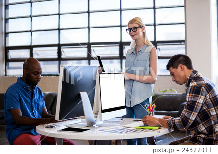 Team of business people working together in office 24322011