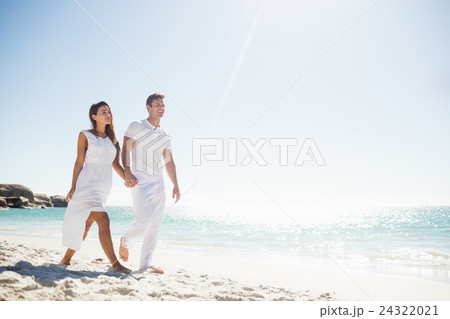 Cute couple holding hands Cute couple holding hands 24322021