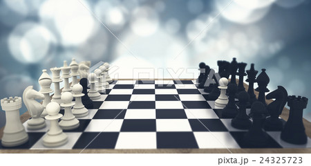 Composite image of black and white chess pawns defecting Composite image of black and white chess pawns defecting 24325723