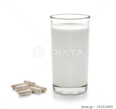 pill and glass of milk isolated  24352905
