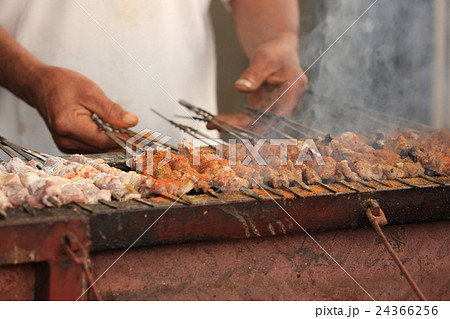 cooking traditional food kebab in xinjiang,china 24366256