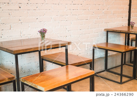 Room interior white brick wall with wooden table 24366290