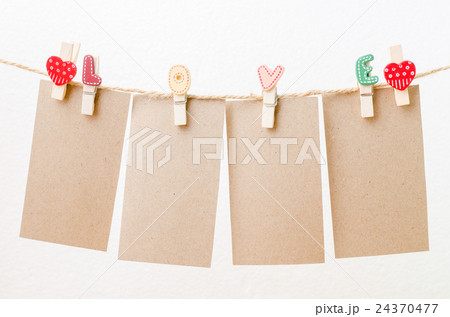 Blank paper hanging on love clothesline 24370477