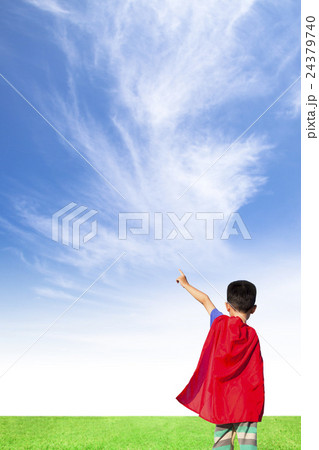 little boy wore superhero suit and point to sky little boy wore superhero suit and point to sky 24379740