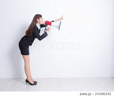 business woman talking in megaphone 24396292