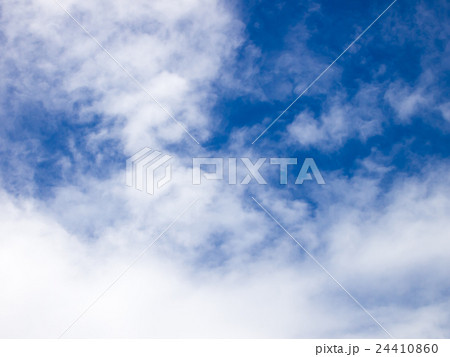 Clear blue sky with white cloud background 24410860