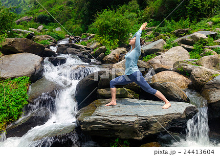 Woman doing Ashtanga Vinyasa Yoga asana Woman doing Ashtanga Vinyasa Yoga asana 24413604
