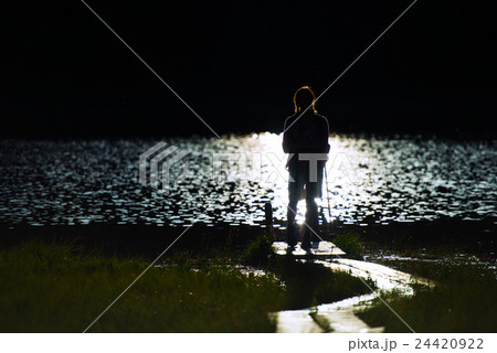 Young girl in hike in silhouette Young girl in hike in silhouette 24420922