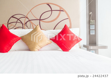Pillow on bed 24422437