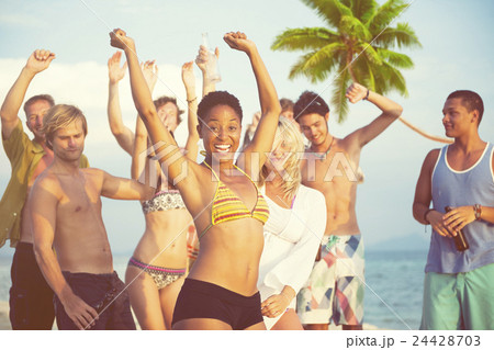 Group of Young People Celebrating by the Beach 24428703