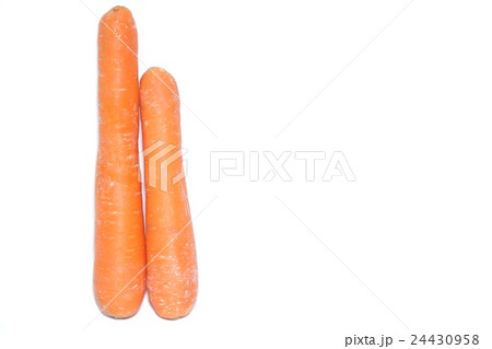 Isolated two fresh whole raw carrots on the white Isolated two fresh whole raw carrots on the white 24430958