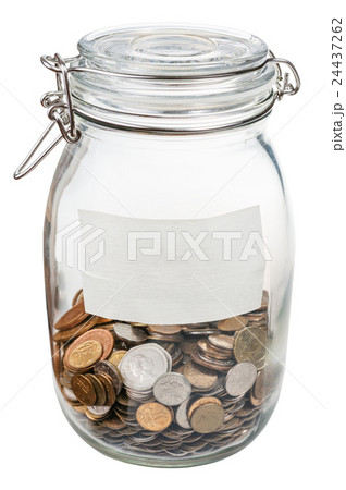 closed glass jar with empty label and saved coins closed glass jar with empty label and saved coins 24437262