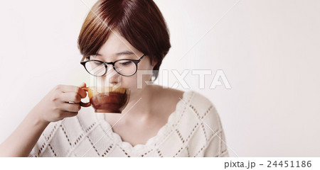Asian Girl Drinking Tea Beverage Refreshment Relaxation Concept 24451186