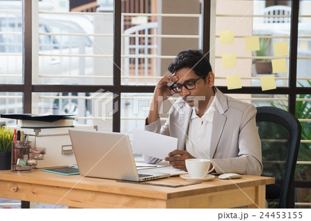 indian male with a letter  24453155