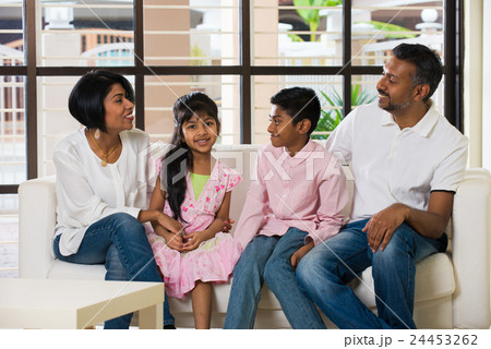 happy indian family at living room happy indian family at living room 24453262