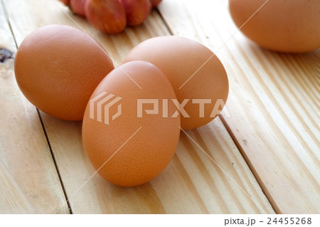 Eggs on wooden table with selective focus 24455268