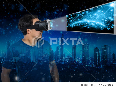 Double exposure of Asian man wearing virtual reality showing the earth planet with network line over star with the earth and cityscape background,Elements of this image furnished by NASA, VR concept Double exposure of Asian man wearing virtual reality showing the earth planet with network line over star with the earth and cityscape background,Elements of this image furnished by NASA, VR concept 24477963