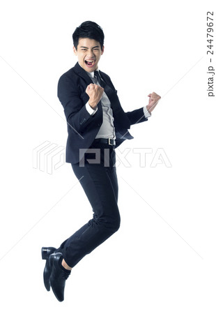 Businessman jumping in the air 24479672