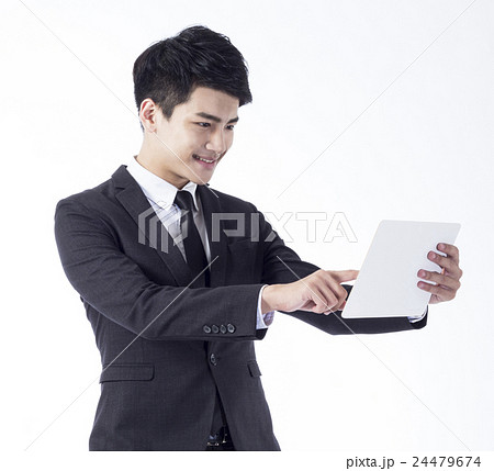 portrait of young businessman 24479674