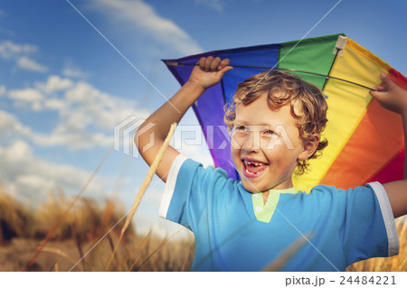 Little Boy Playing Kite Fun Happiness Enjoyment Outdoors Concept Little Boy Playing Kite Fun Happiness Enjoyment Outdoors Concept 24484221