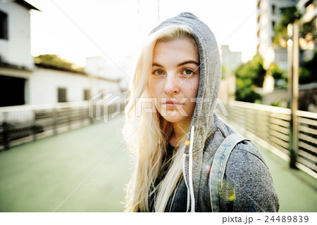 Young Woman Portrait Walking Active Concept 24489839
