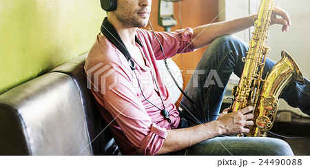 Jazzman Musical Artist Playing Saxophone Concept 24490088