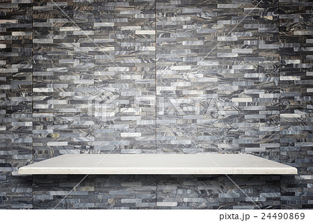 Empty top of natural stone shelves and stone wall background 24490869