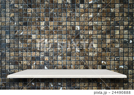 Empty top of natural stone shelves and stone wall background Empty top of natural stone shelves and stone wall background 24490888