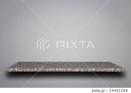 Empty top of natural stone shelves and stone wall background 24491299