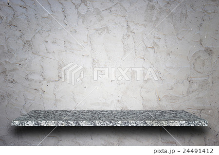 Empty top of natural stone shelves and stone wall background 24491412