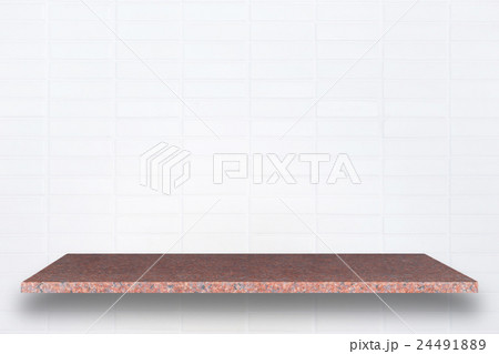 Empty top of natural stone shelves and stone wall background Empty top of natural stone shelves and stone wall background 24491889