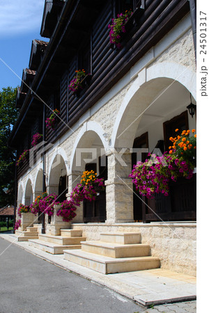beautiful wooden facade decorated with flowers beautiful wooden facade decorated with flowers 24501317