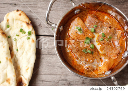 Indian naan bread with curry 24502769