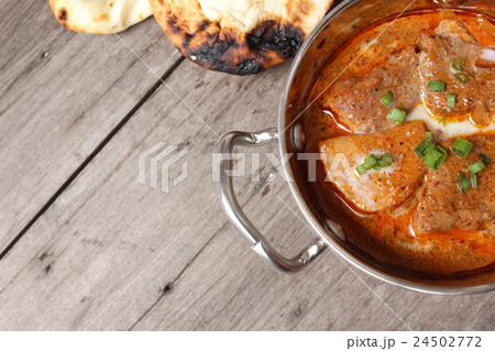 Indian naan bread with curry Indian naan bread with curry 24502772