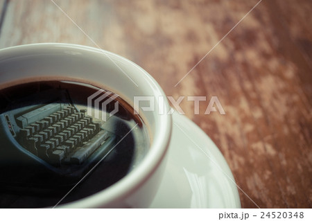 Typewriter reflection on coffee Typewriter reflection on coffee 24520348