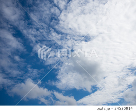 The blue sky with white cloud as background The blue sky with white cloud as background 24530914