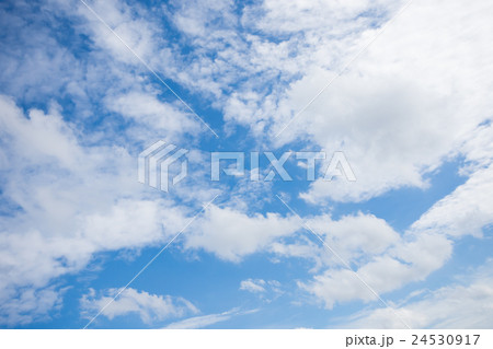 The blue sky with white cloud as background The blue sky with white cloud as background 24530917