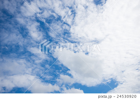 The blue sky with white cloud as background The blue sky with white cloud as background 24530920