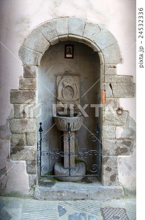 Ancient stone wall fountain Ancient stone wall fountain 24532336