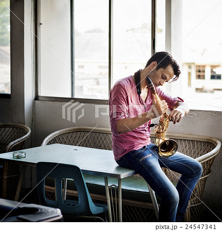 Jazzman Musical Artist Playing Saxophone Concept 24547341