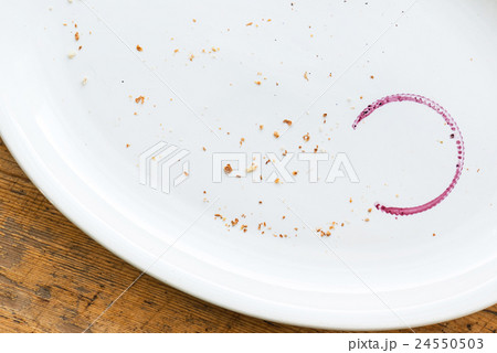 empty plate with wine stain empty plate with wine stain 24550503