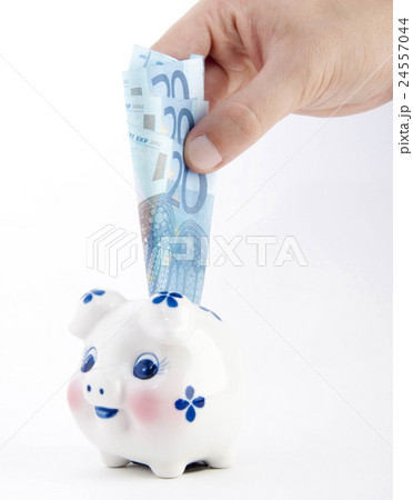hand euro with piggy bank 24557044