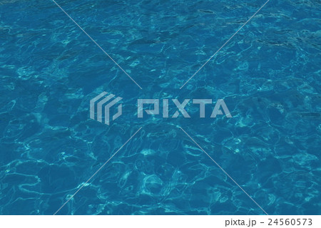 Blue swimming pool rippled water detail 24560573