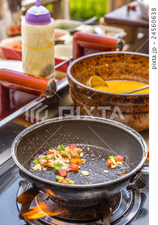 Cooking Omelet in Pan 24560638