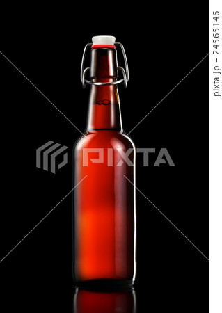 Swing top bottle of light beer isolated on black Swing top bottle of light beer isolated on black 24565146