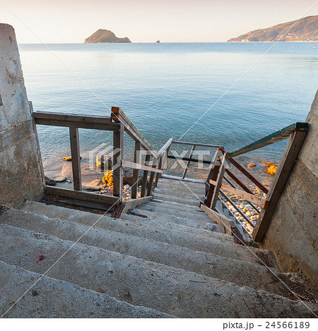 Wooden stairs going down to the sea coast 24566189