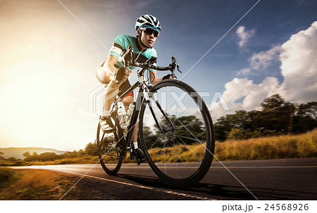 Asian men are cycling road bike in the morning Asian men are cycling road bike in the morning 24568926