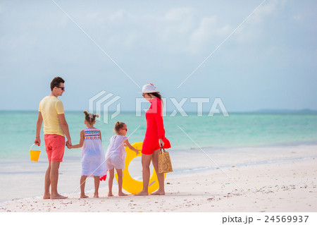 Family of four on vacation Family of four on vacation 24569937