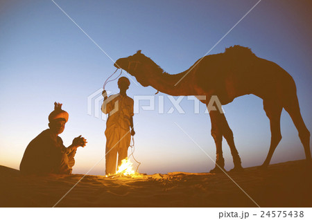 Two Indigenous Indian Men With Their Camel Concept Two Indigenous Indian Men With Their Camel Concept 24575438